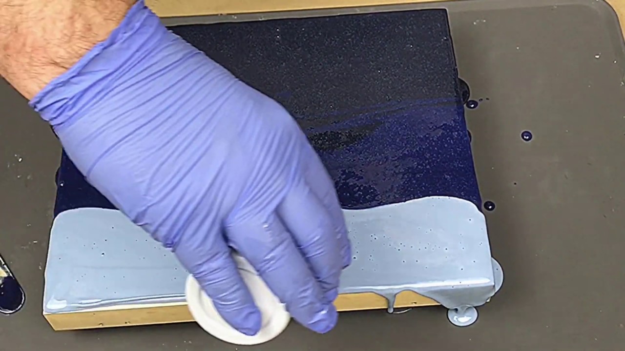 A resin pour on a wooden box lid with a difference