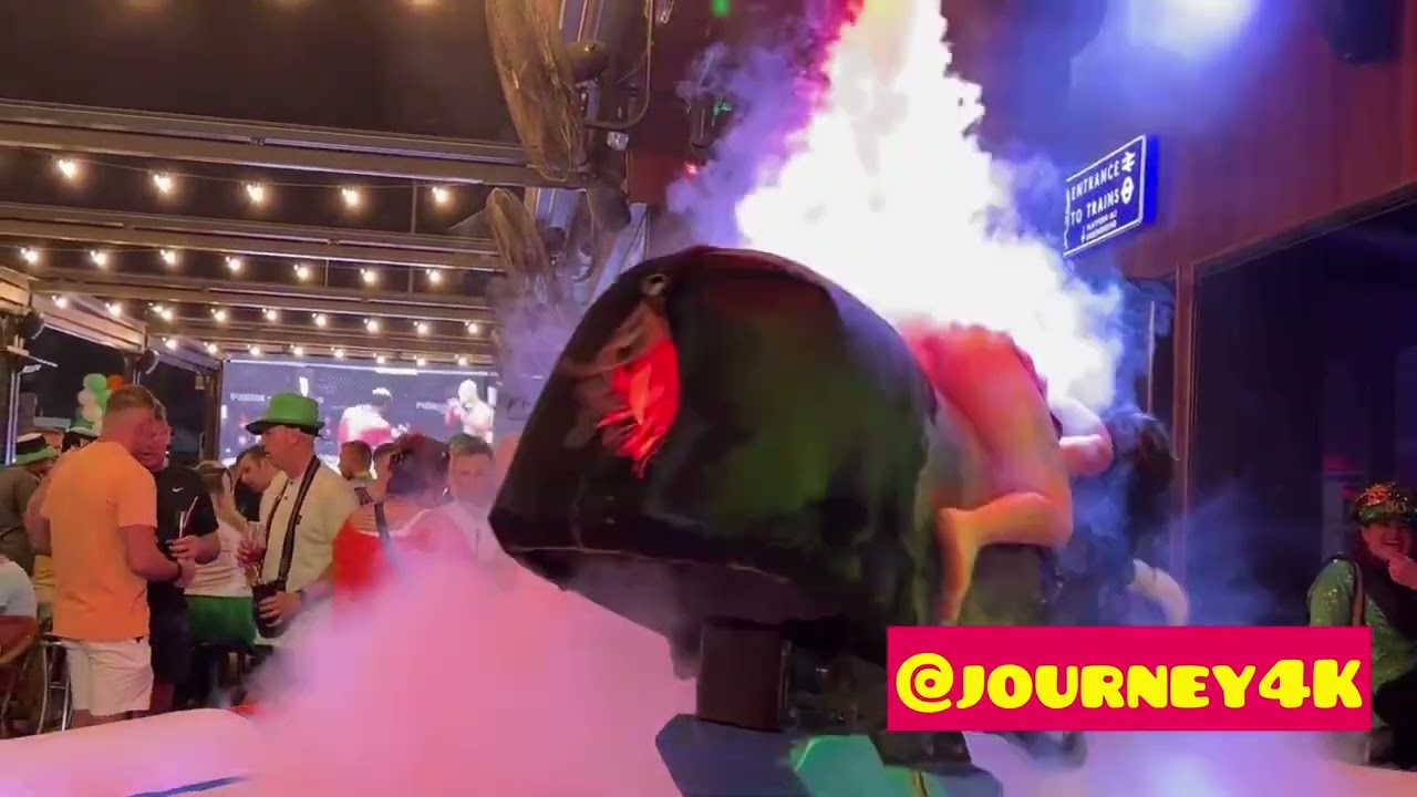 Girl in Beautiful Red Dress Riding on a Bull in Benidorm   Bull Riding 4K