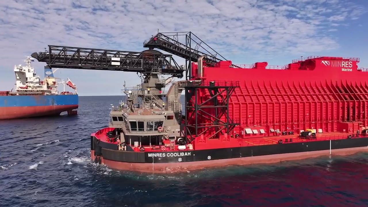 MinRes transhippers in action delivering first ore on ship