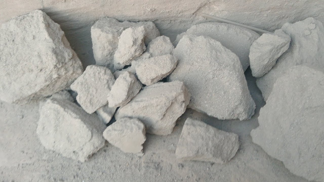 Brand New video of soft and dusty rocks of sand cement crumbling dry on floor ❤️🖤