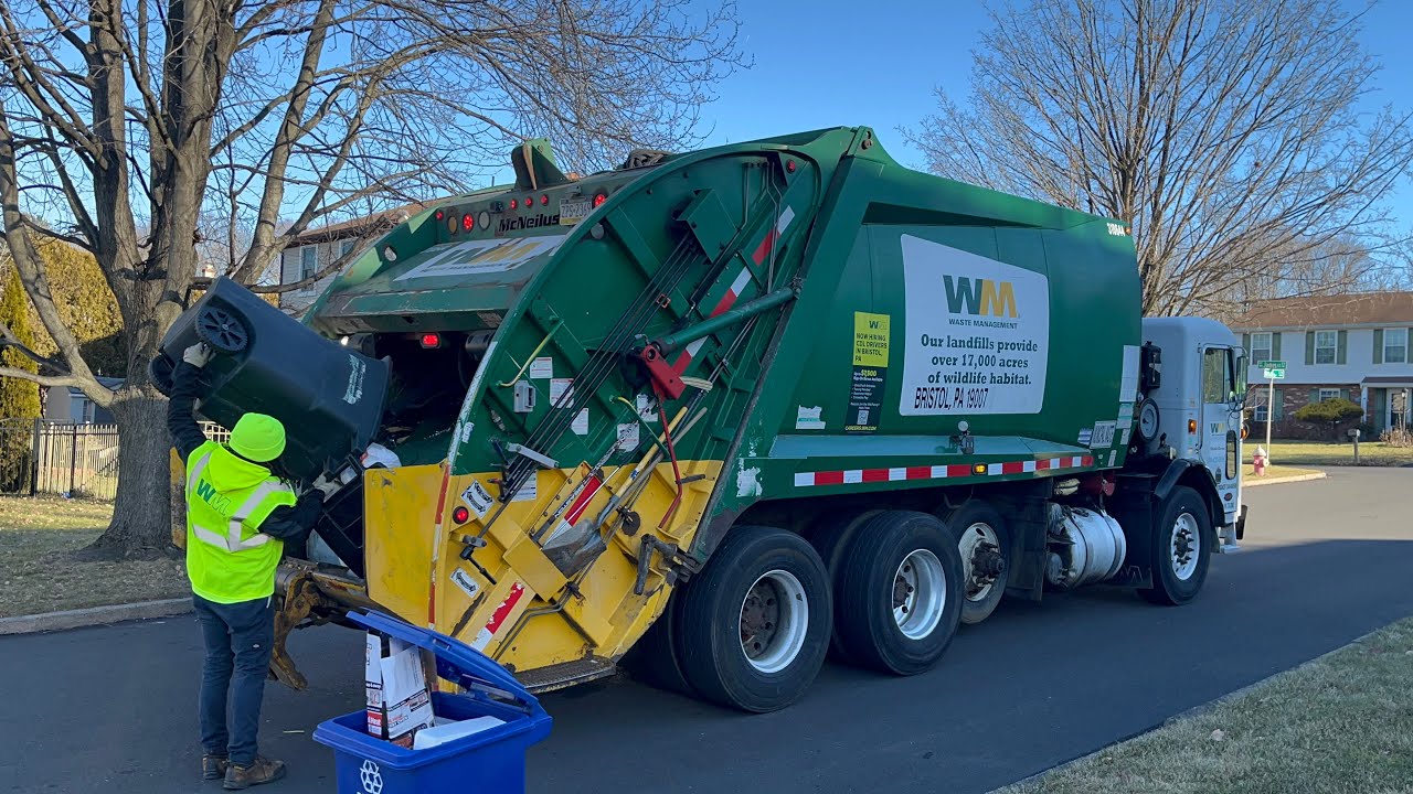 Waste Management Diesel Pete 320 McNeilus rear loader garbage truck
