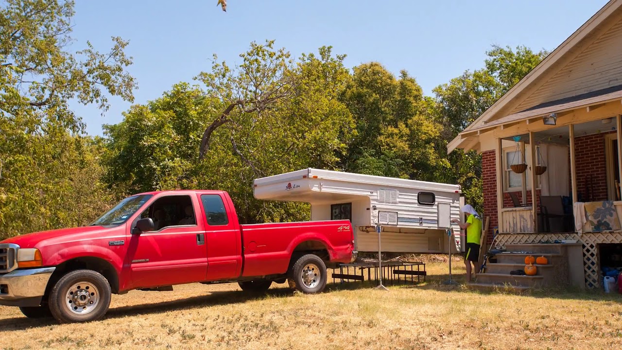Unloading our Sun-Lite Eagle WT Truck Camper from our F250