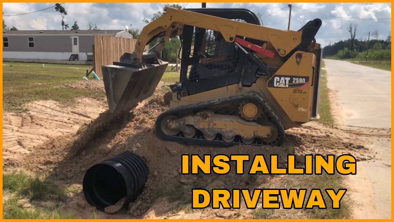 installing culvert pipe for driveway using CAT 259D skid steer