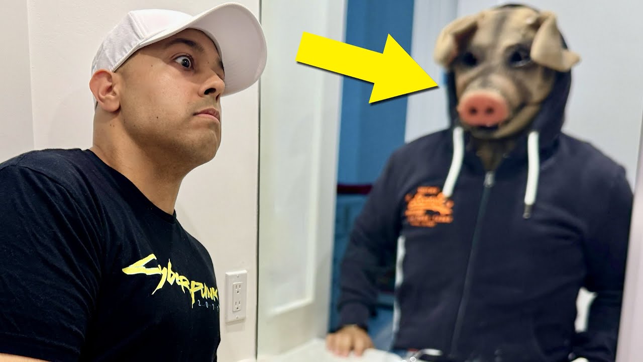 THERE'S A STRANGE DUDE IN MY MIRROR...
