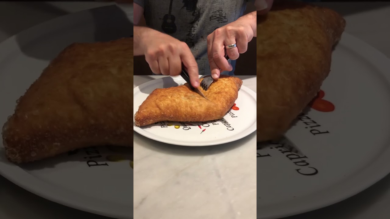 Probably the Best way to Eat a Panzerotti. #panzerotti #food #italia #fried #pizzeria #pizza