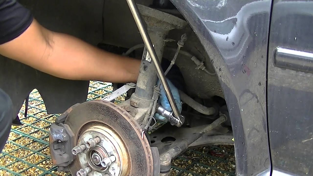 Снятие переднего амортизатора VW