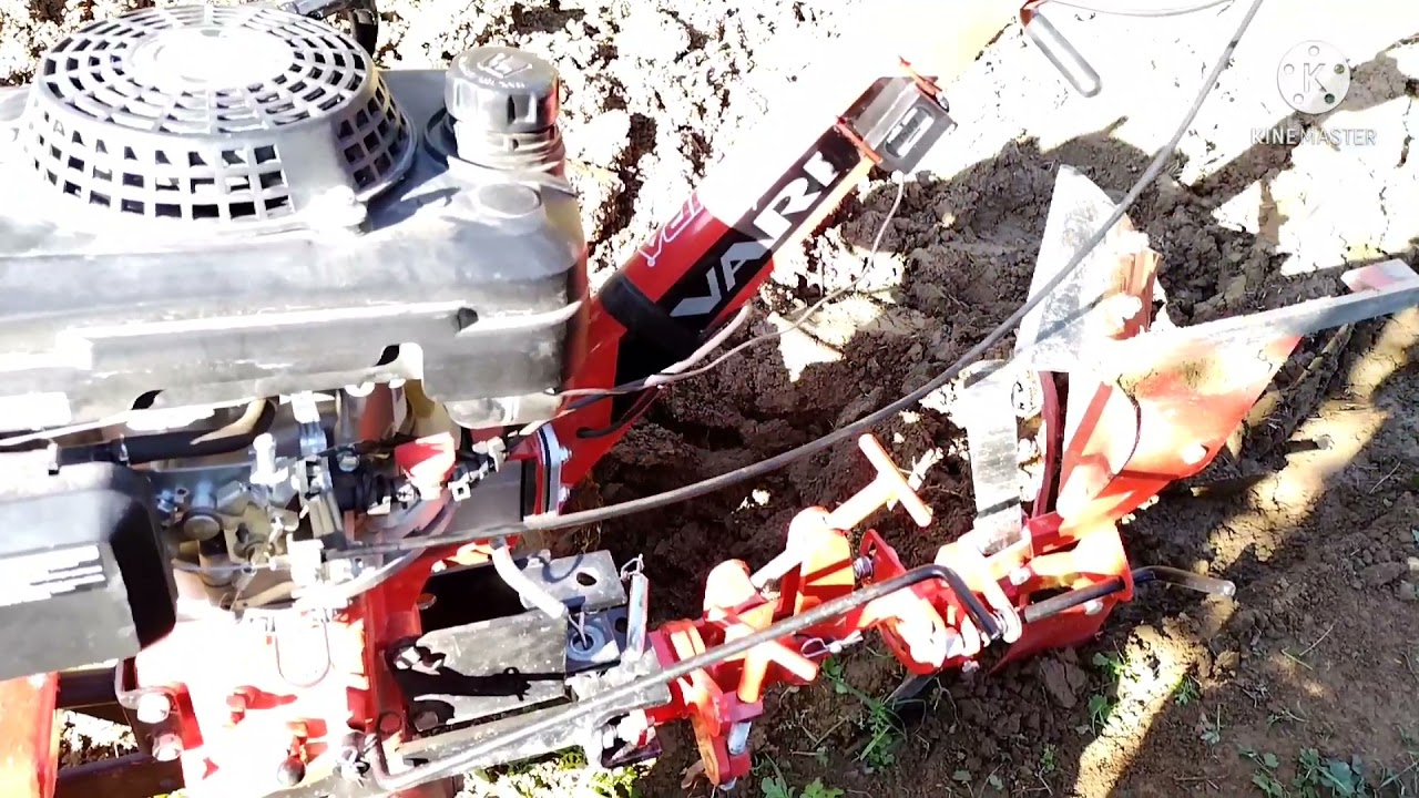 Vari XP 200. Orba novým pluhom od firmy Tecák kovo. Obracák 180° . Je to typ poloskrutkového pluhu.