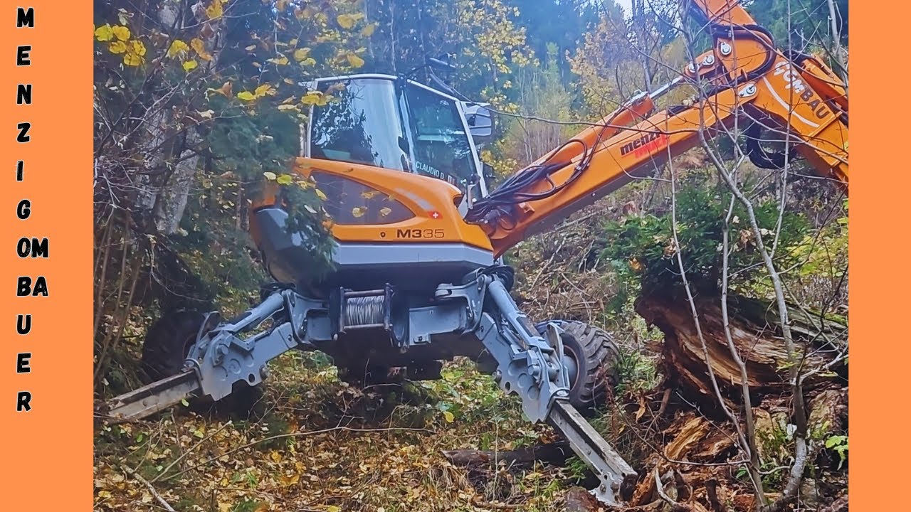 menzi muck m335 in the  forest of Switzerland