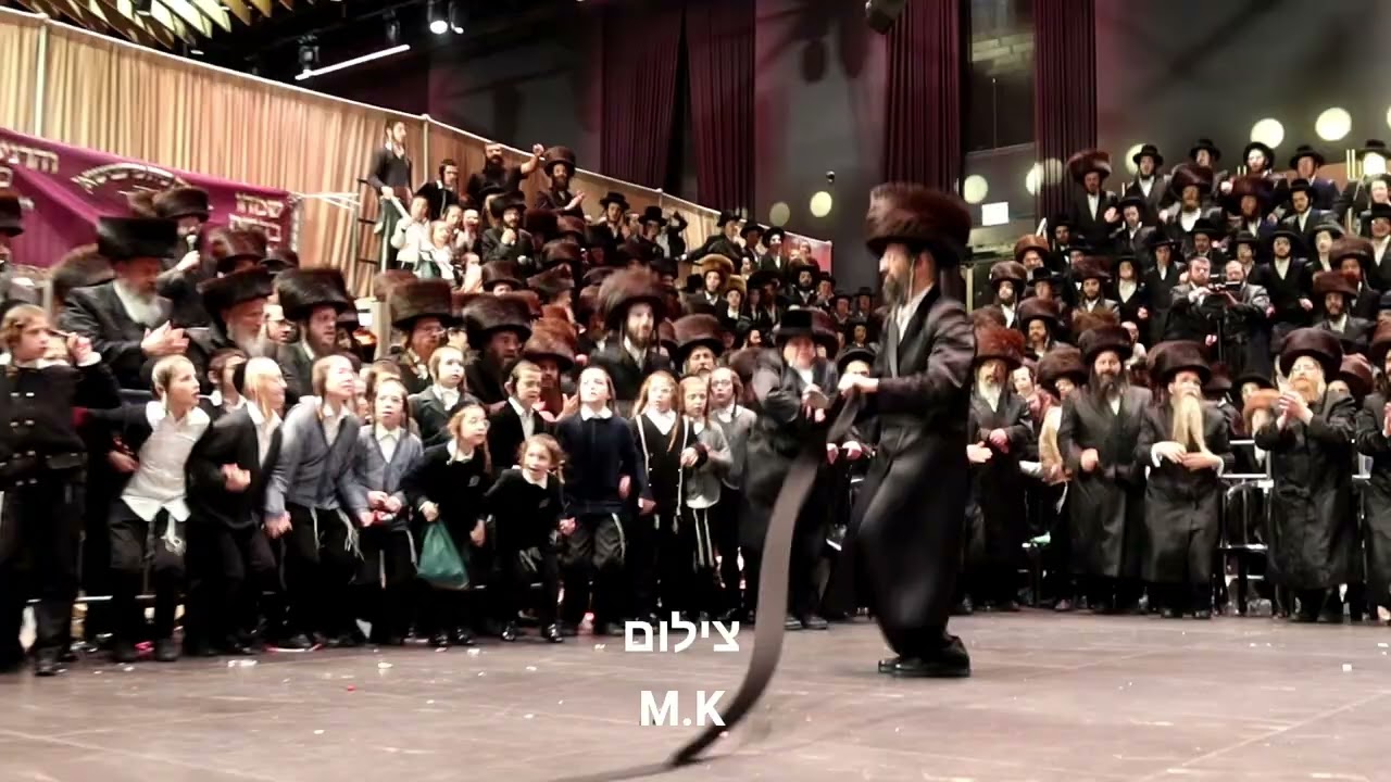 כ
