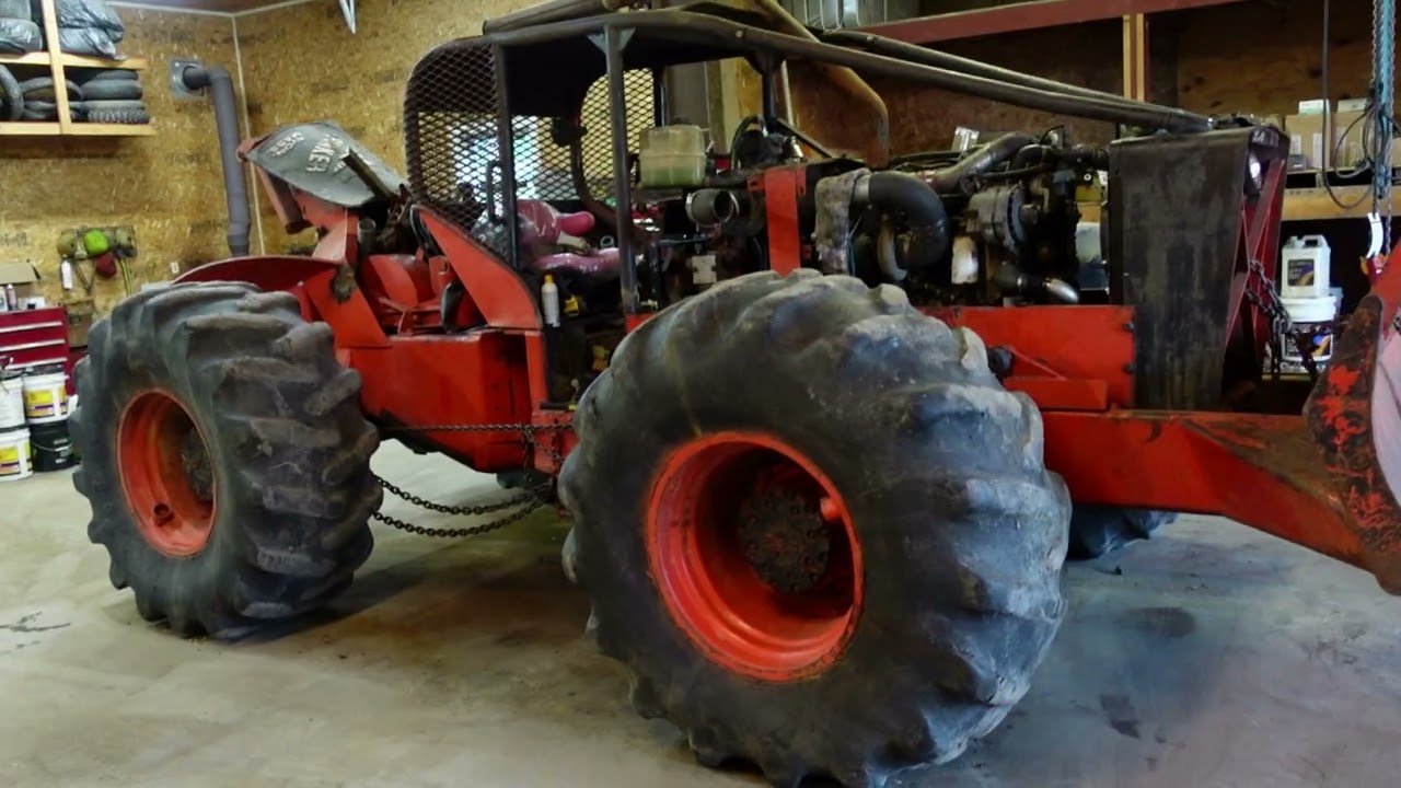 Installing the Hydraulic pump, and Front Axle on the Timberjack 360 Skidder