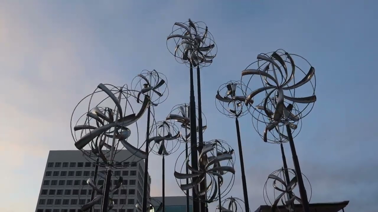 Whitaker Wind Sculpture Display Merschel Park Nebula and Galaxy in Stainless Steel.