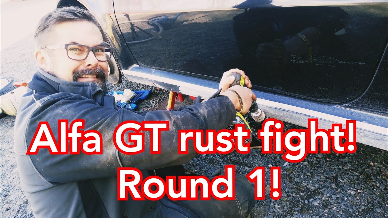 Alfa Romeo GT fighting rusty sills!  Round 1!