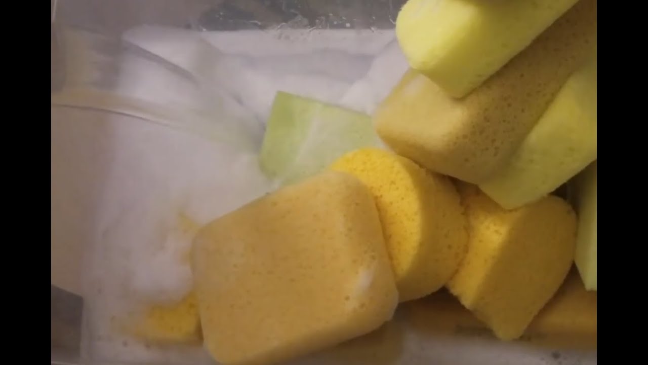 Sponges soaked in Fabuloso mixed with some NICE * HOT * WATER - THICK White Suds filling the bucket