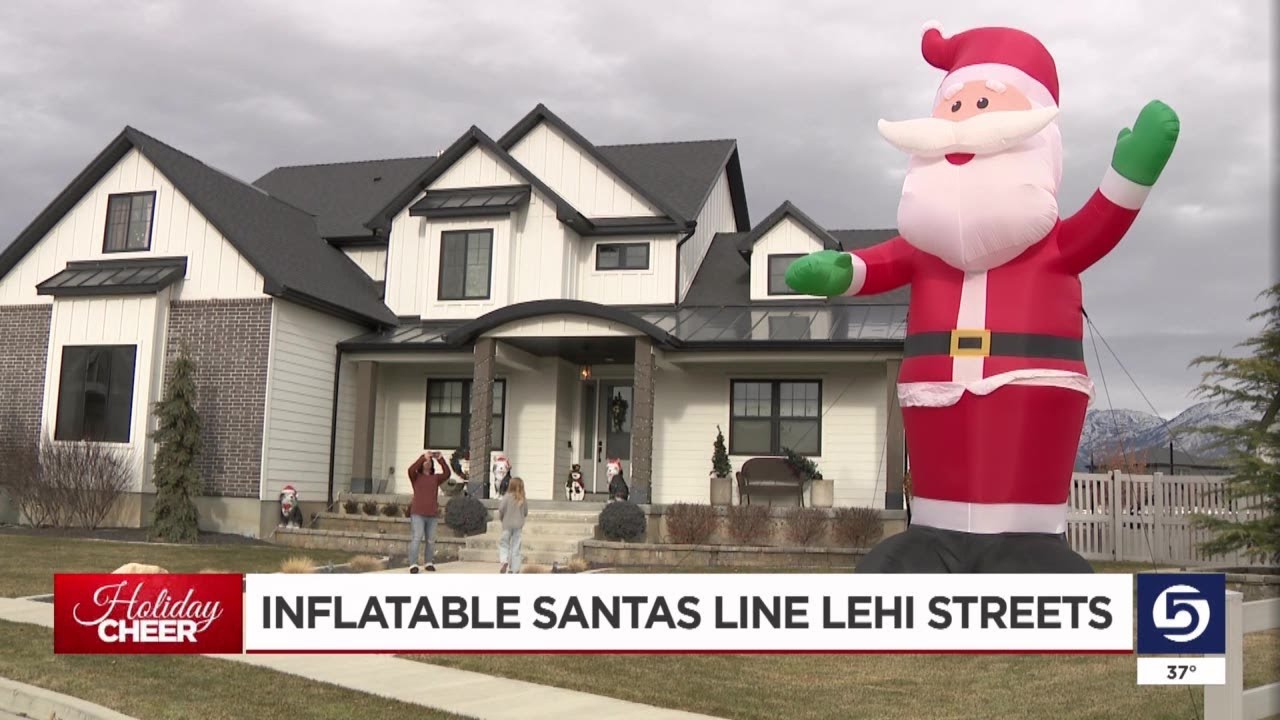 Inflatable Santas line Lehi streets