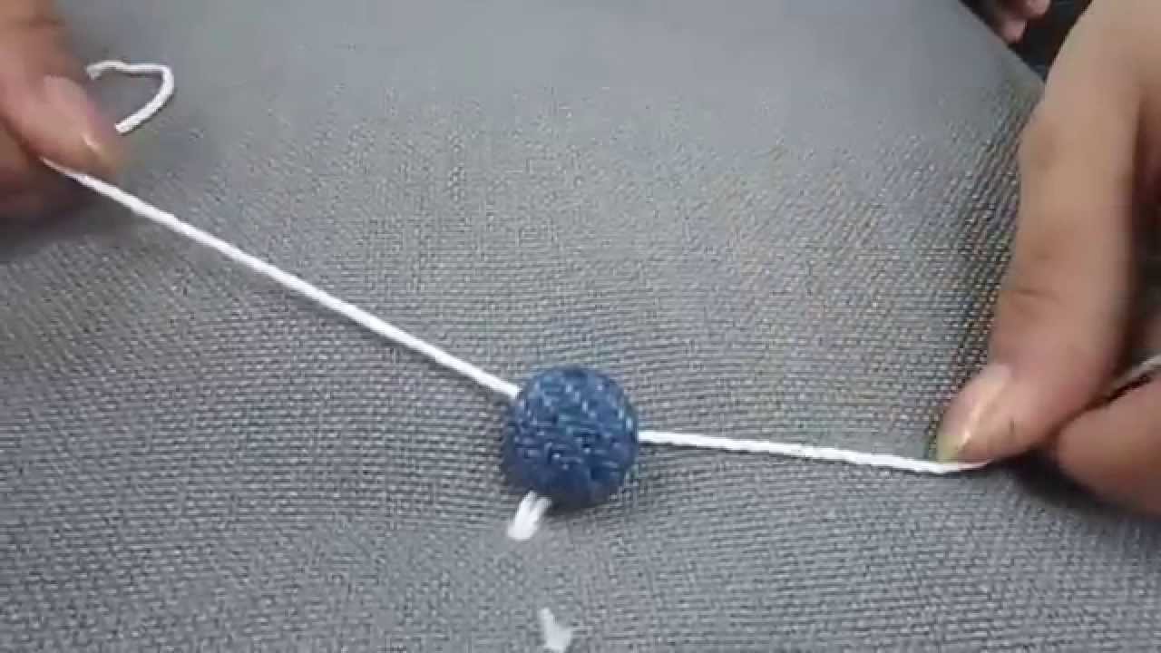 How to fit button in pillow or cushion