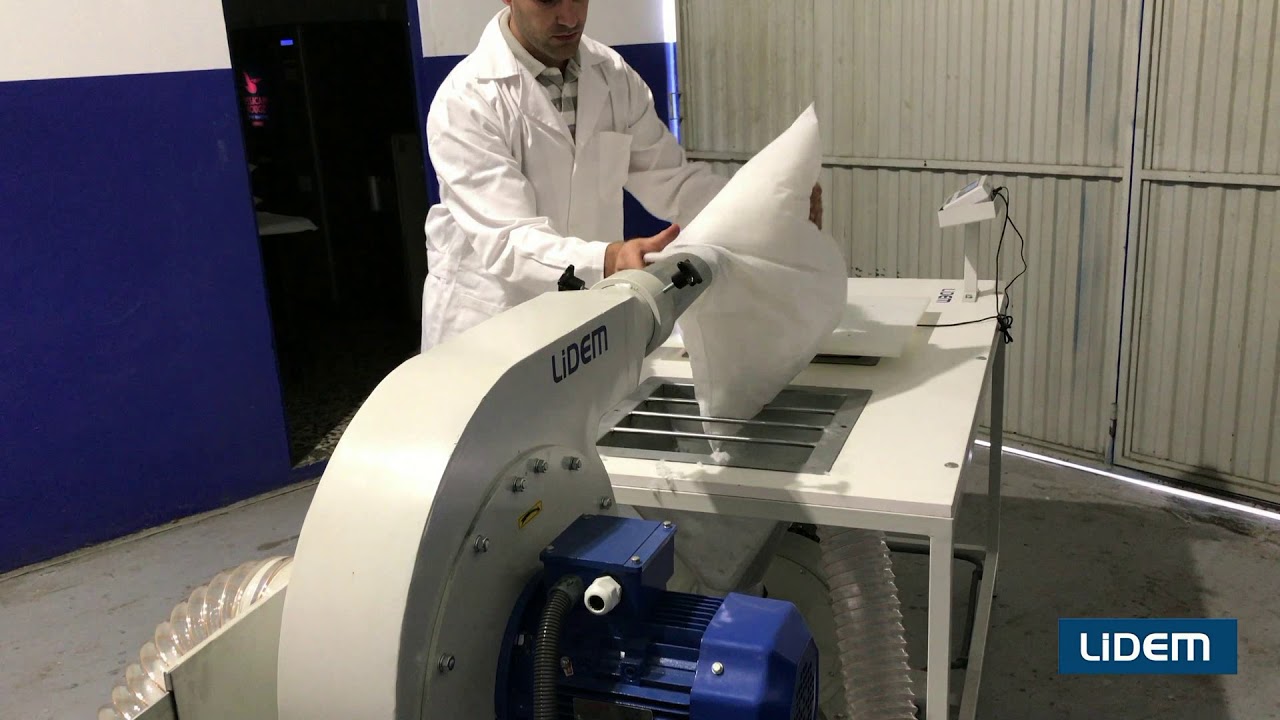 Stuffing machine for pillows, cushions and plush toys. With high precision scale and feedback system