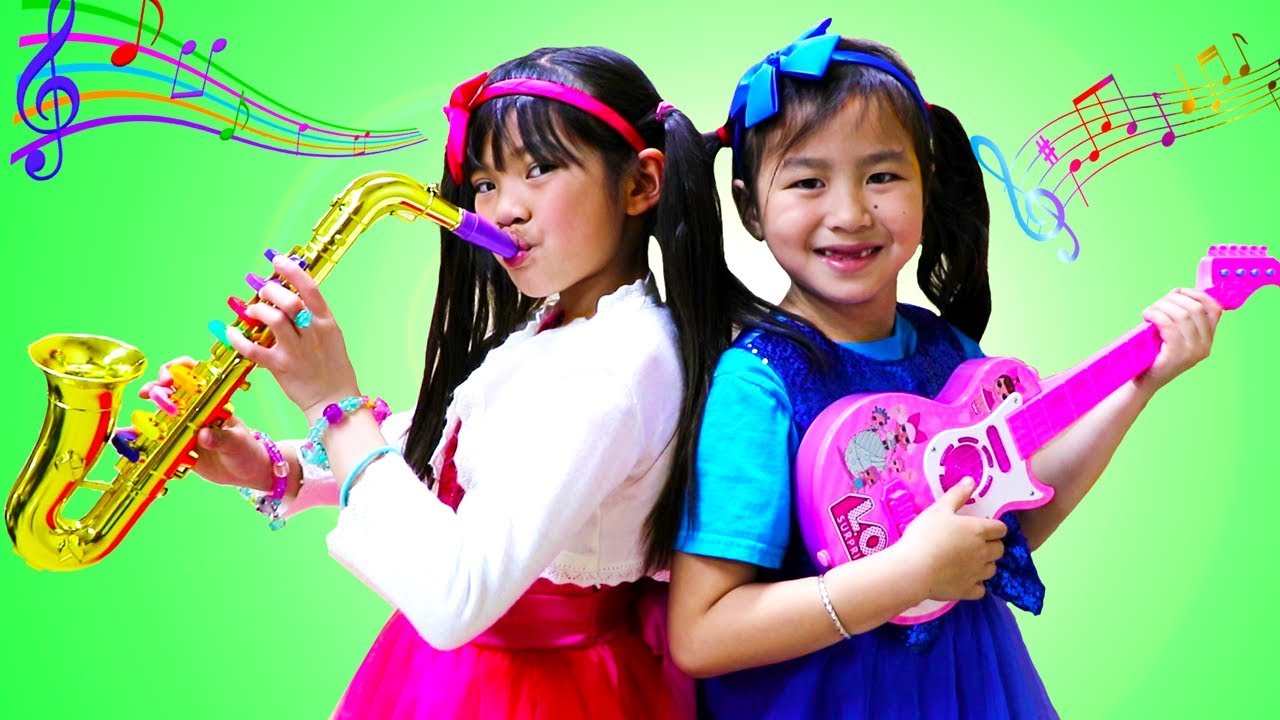 Emma y Jannie Tocando Instrumentos Musicales de Juguete | Canciones Infantiles