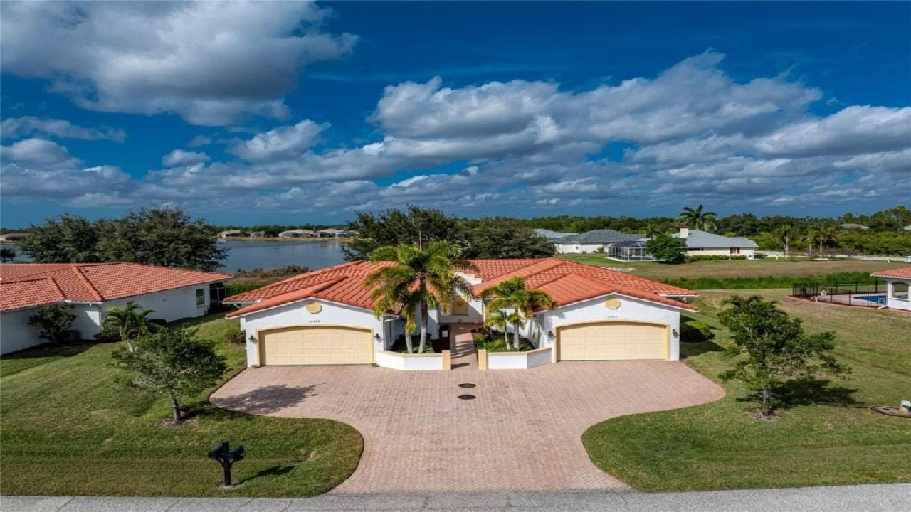 12424 GROUSE AVENUE 15A, PORT CHARLOTTE, FL Presented by Marie Moseley.