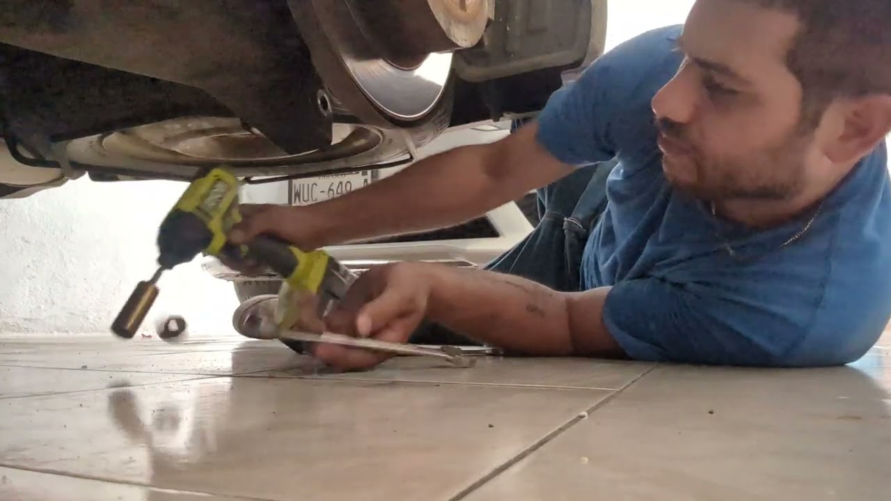 COMO CAMBIAR AMORTIGUADORES MITSUBISHI GRANDIS 2007