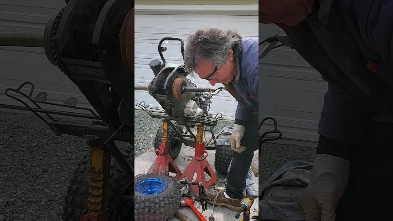 Honda TRX-70 rear axle removal