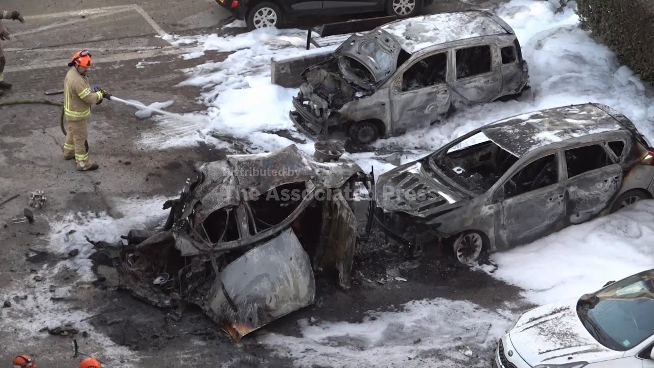 Fires engulf vehicles in central Israel after Iranian missile salvos