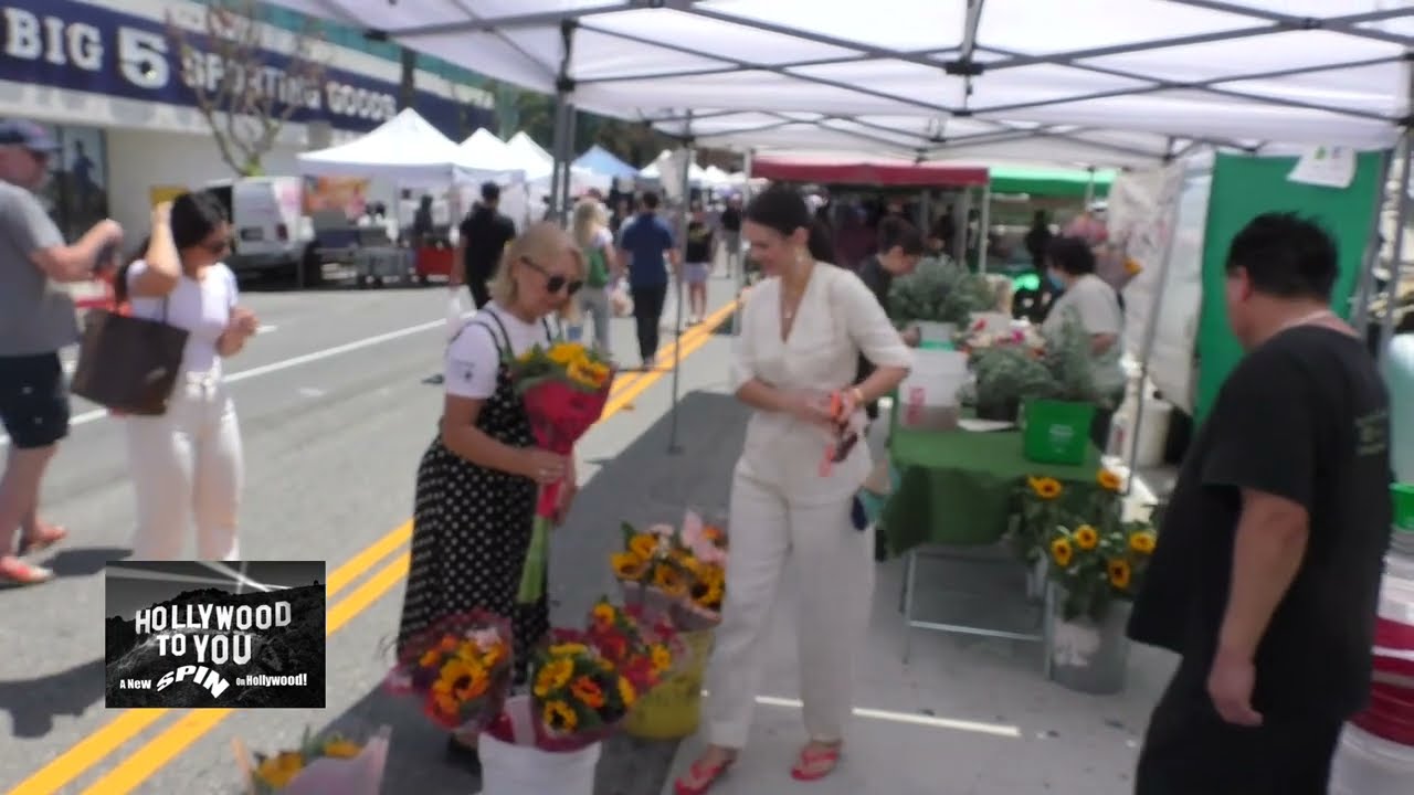 Natasha Blasick buyer her mom flowers on Mothers Day while shopping at Studio City Farmers Market