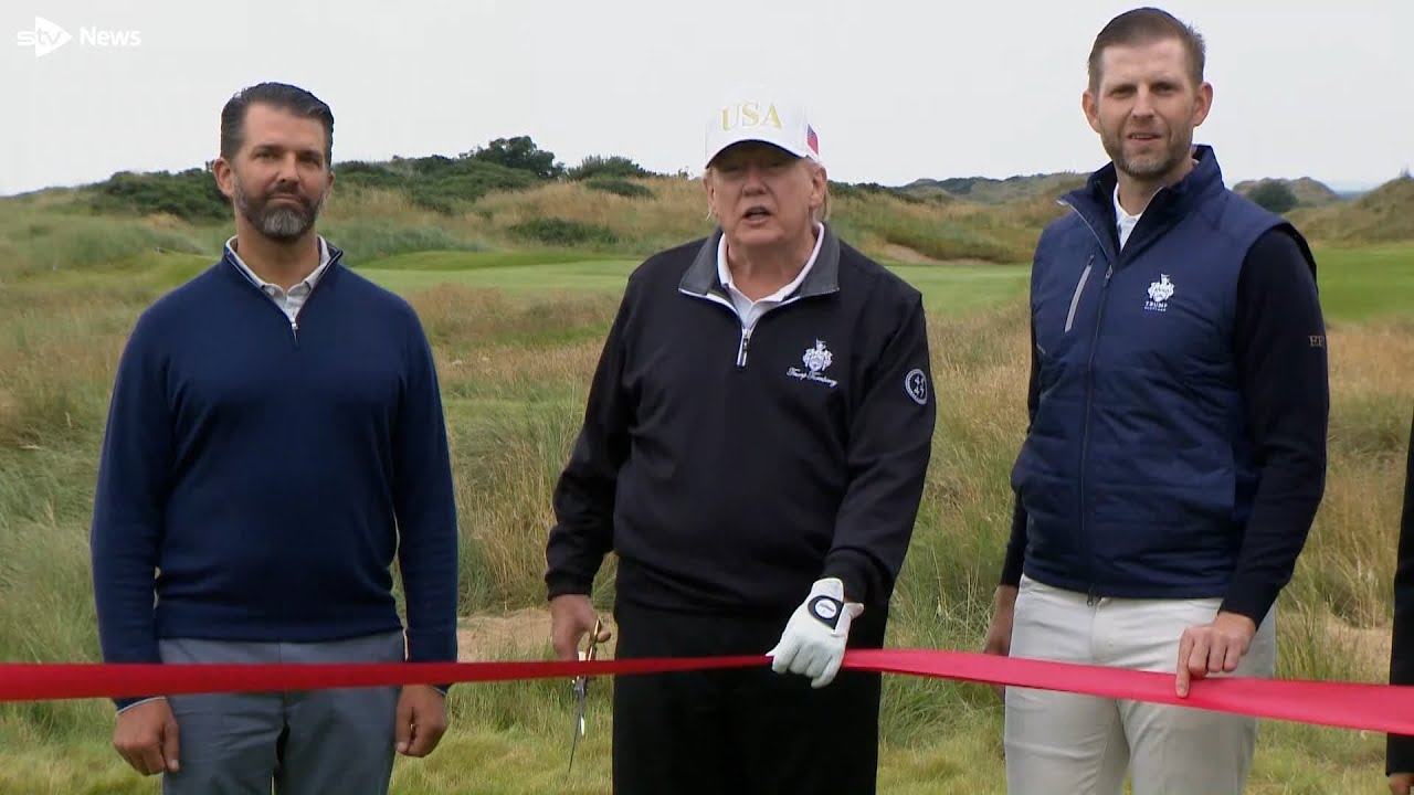Donald Trump cuts ribbon at new golf course