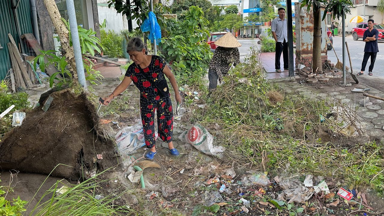 Mrs  Lao has had back pain for more than a year but no one helps clean up the grass and trash in fro