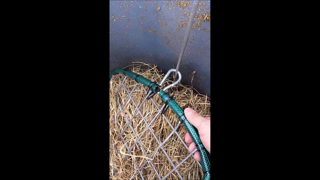 Homemade slow feeder for horse hay