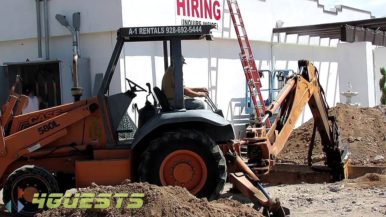 CASE 580 L BACKHOE IN ACTION