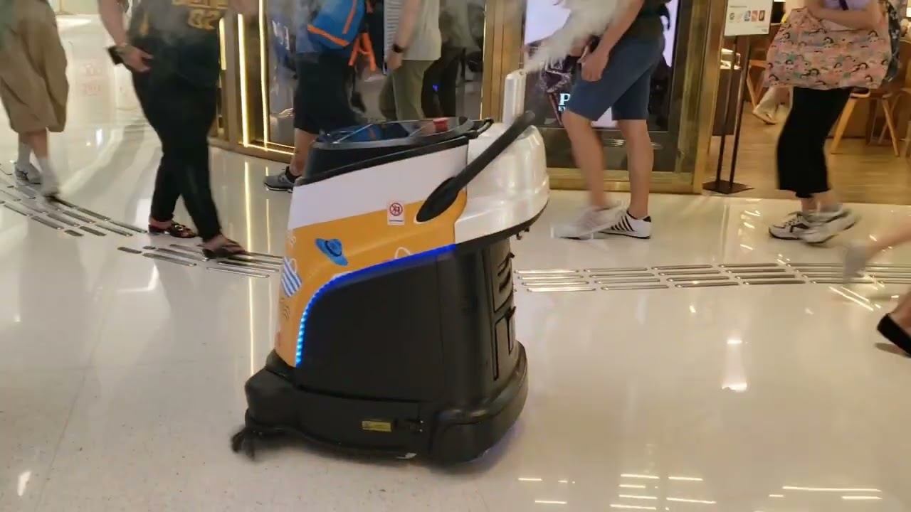 Robot vacuum cleaner in the shopping mall.