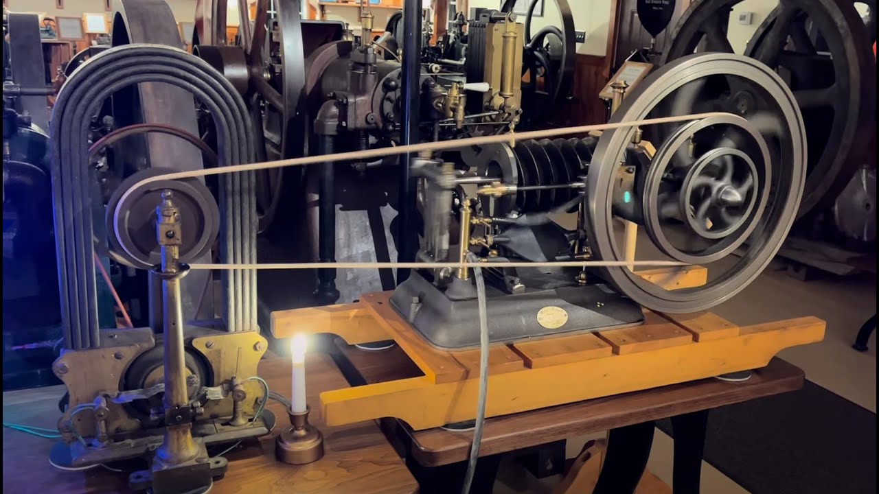 An original 1877 Zénobe Gramme Dynamo,  powered by an 1883 Forest  flame ignition slide valve engine