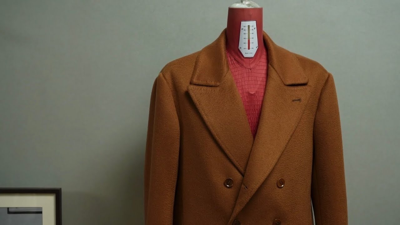 Creating a bespoke oversized polo coat made from pure cashmere fabrics.