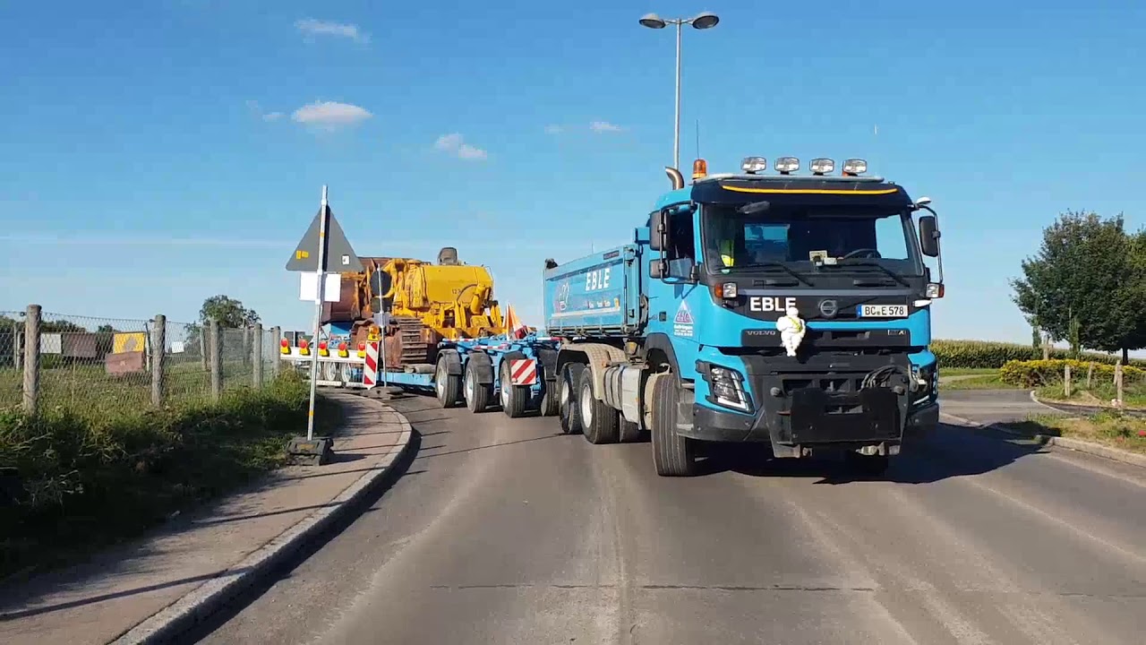 Transport einer CAT 983 mit Scheuerle 6 -Achs Anhängetieflader durch Firma Eble Baltringen