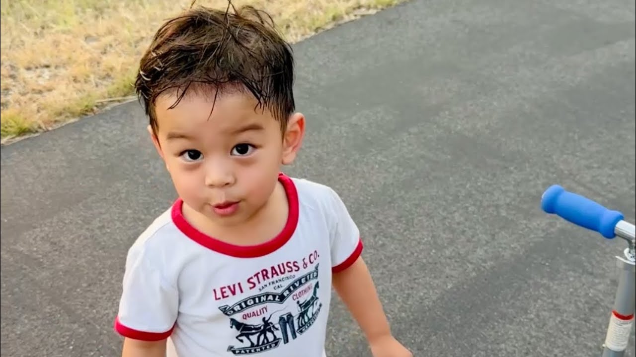 2-Year-Old Riding His Scooter on a Beautiful Summer Evening