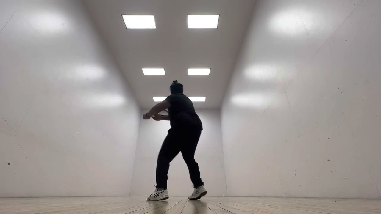Tennis practice in racquetball court
