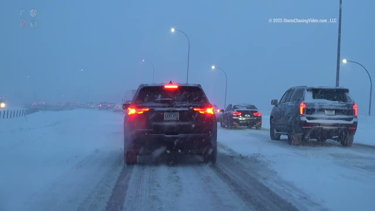 Minneapolis, MN Winter Storm at Rush Hour, Cars in Ditch, And Heavy Snow