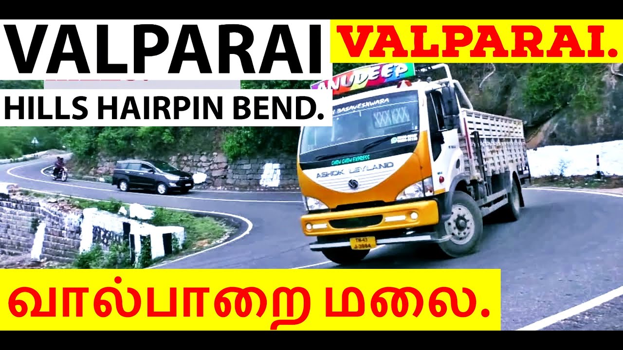 Tourist Bus Ashok Leyland Tempo Turning On Valparai Hills Hairpin Bend Road Pollachi.