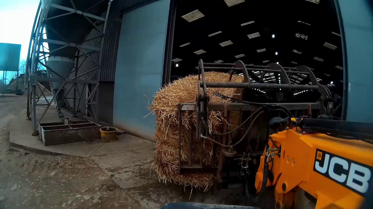 Sweeping silage with JCB TM320s