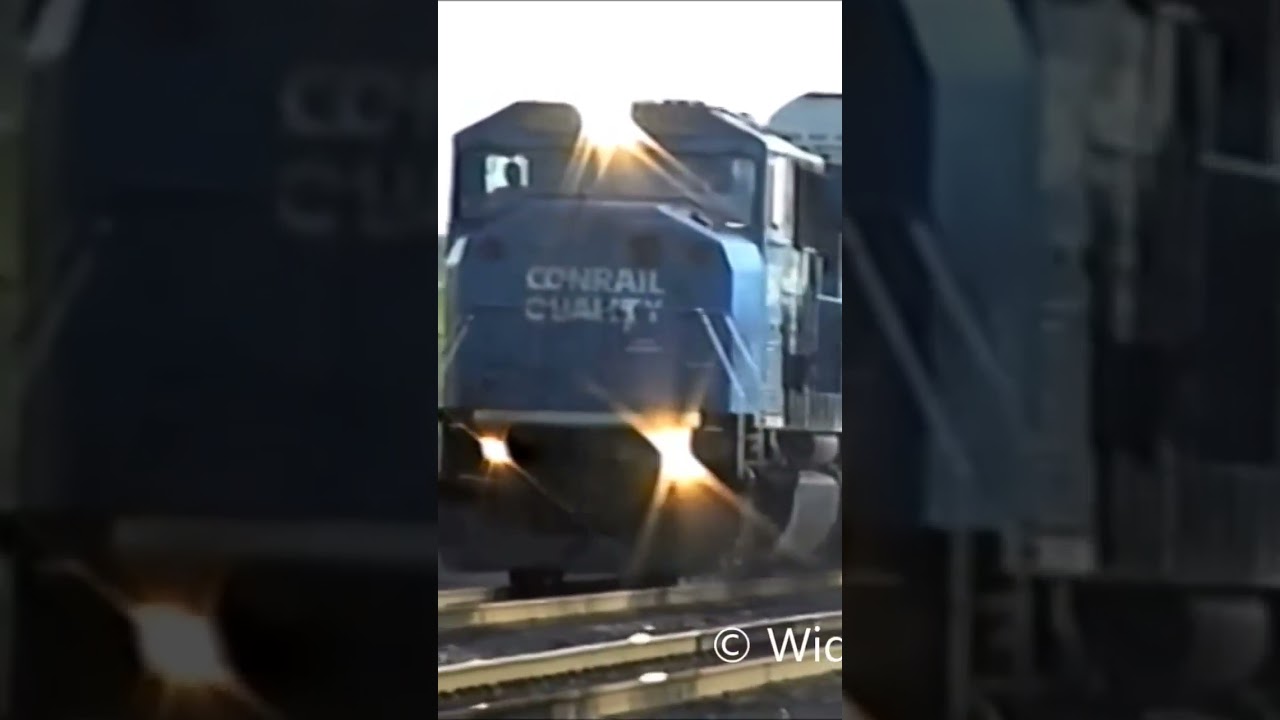 Conrail SD60 engine blows its horn.