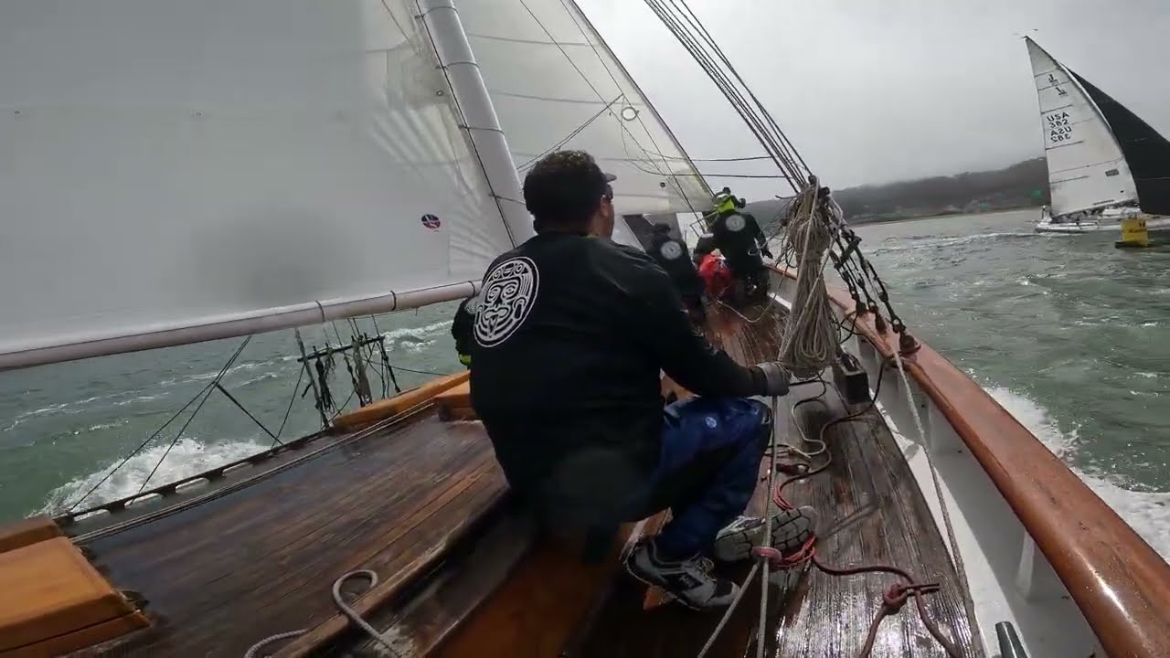 Schooner Mayan rounds Blackaller with the J/105s