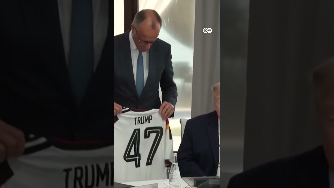 German Chancellor gifts Trump a German national team jersey at the G7 summit