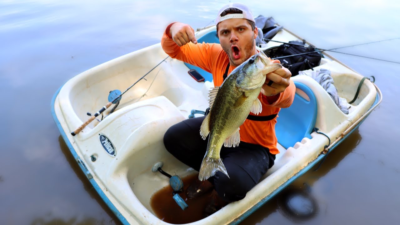 SLAYING BASS out of a PADDLE BOAT!