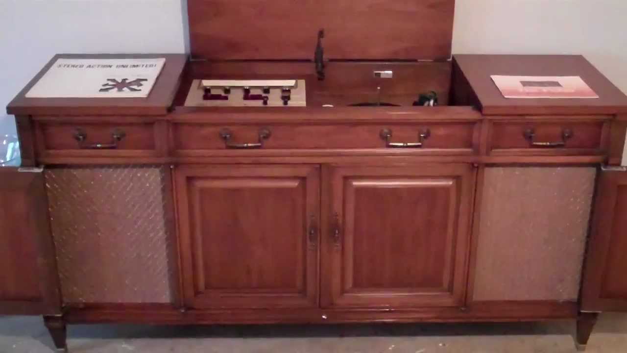 1965 Fisher Ambassador Console Stereo. Playing Stereo Unlimited Action Series. Enjoy!