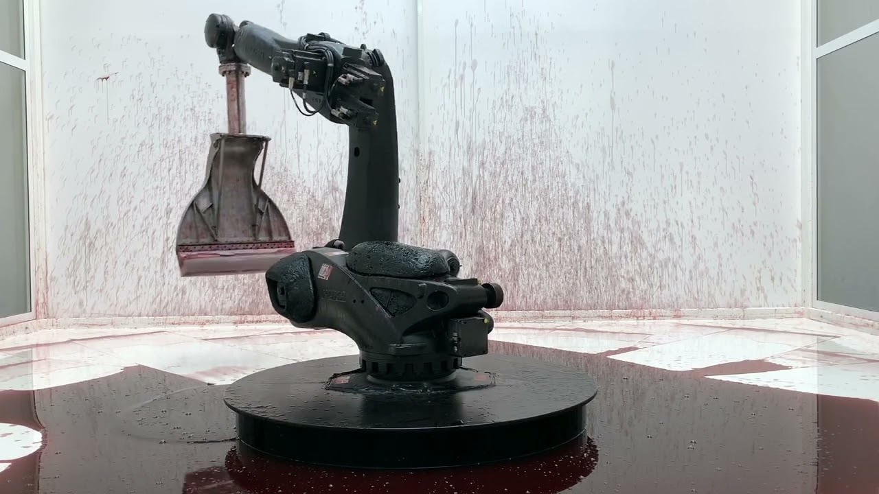 industrial robot continuously sweeps blood-like fluid in sun yuan + peng yu's 'can't help myself'