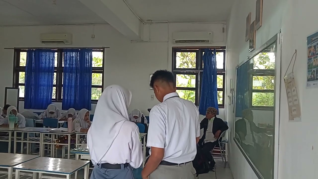 Presentase Faisal dan Natasya X AKL SMK PADI