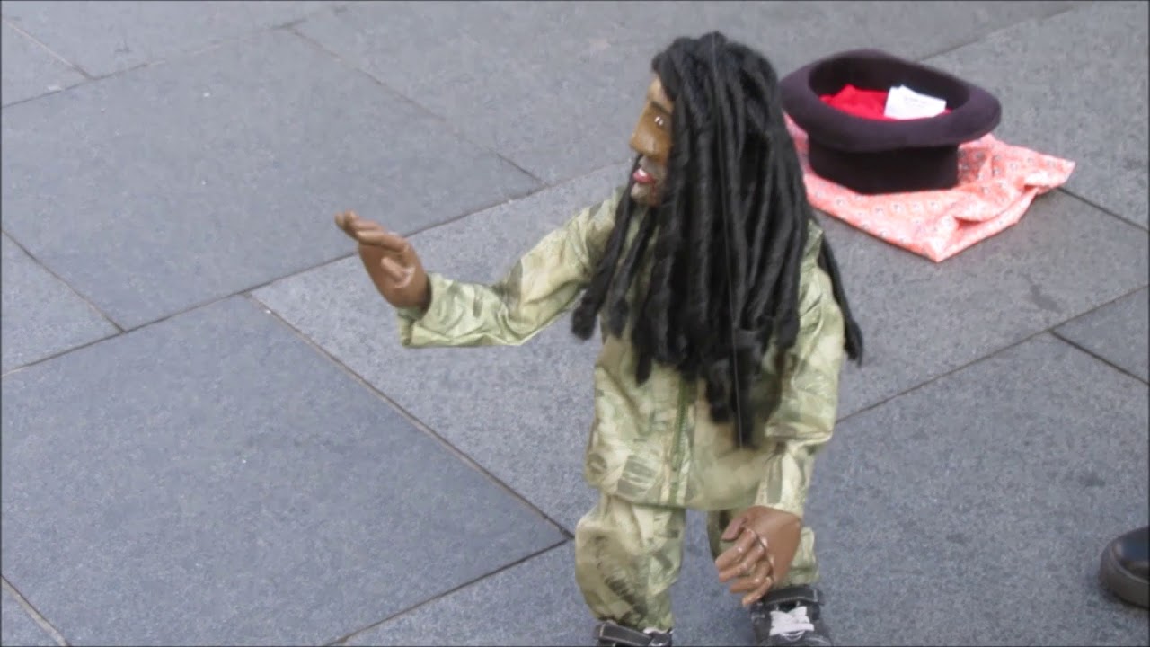 Bob Marley's, Could You Be Loved. Puppet Street Performance.