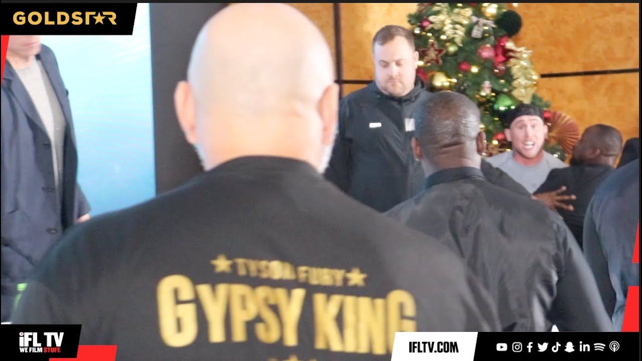 ABSOLUTE CARNAGE!  BIG JOHN FURY THROWS WATER OVER DARREN TILL IN PRESSER, PAIR NEARLY COME TO BLOWS