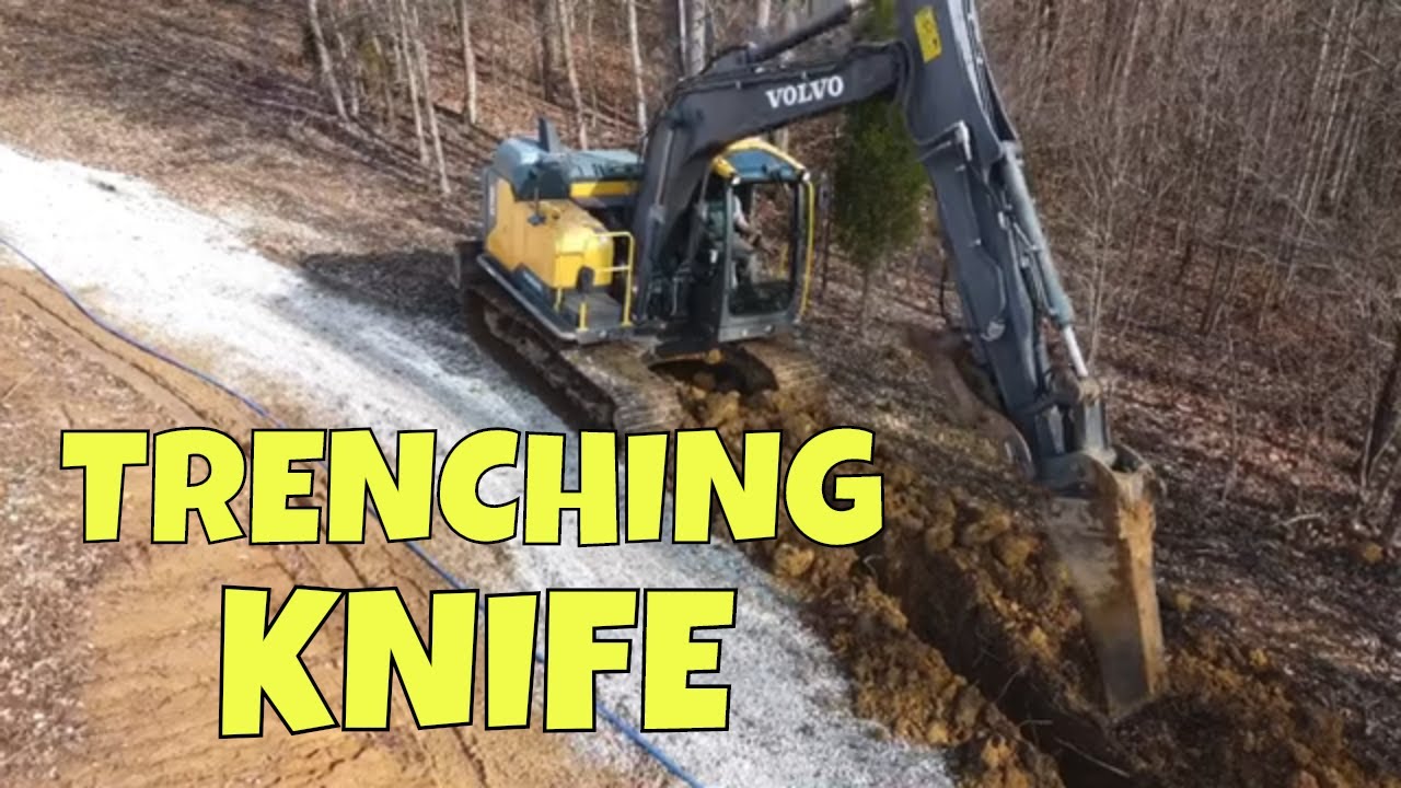 Volvo 140 trenching a water line with custom Dirt Perfect bucket.