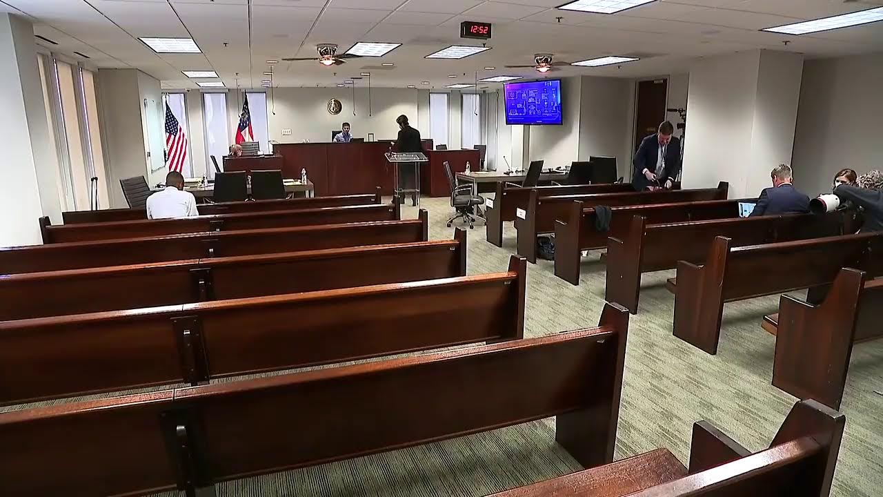 Marjorie Taylor Greene appears in court over lawsuit challenging her re-election